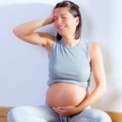 Боли внизу живота во время беременности